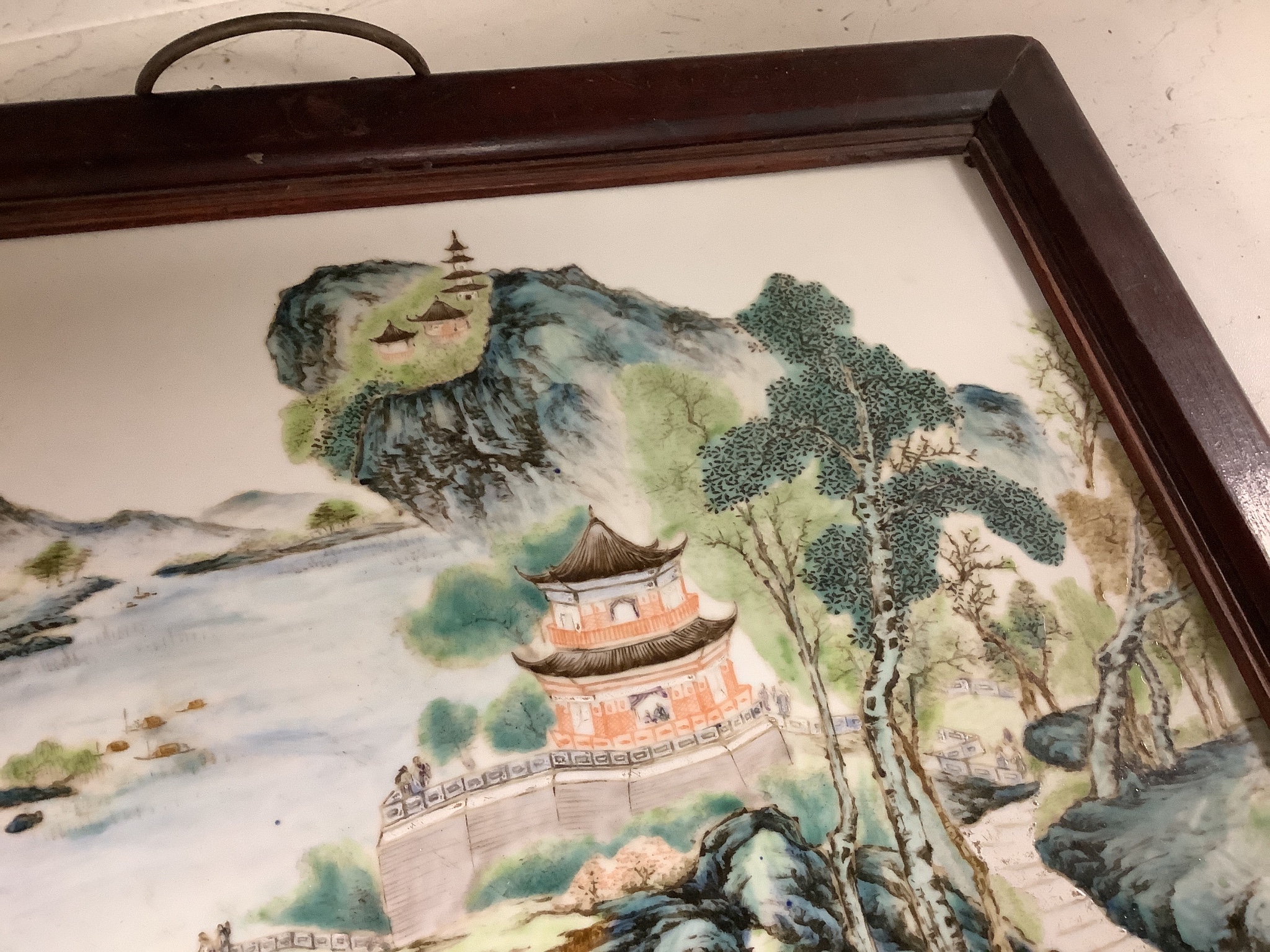 A Chinese enamelled porcelain plaque, in hardwood frame, 27 x 41cm excl. frame